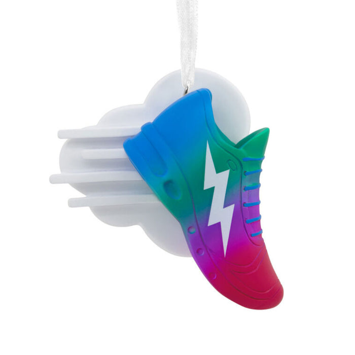 Colorful shoe-shaped toy with a lightning bolt design on a white background