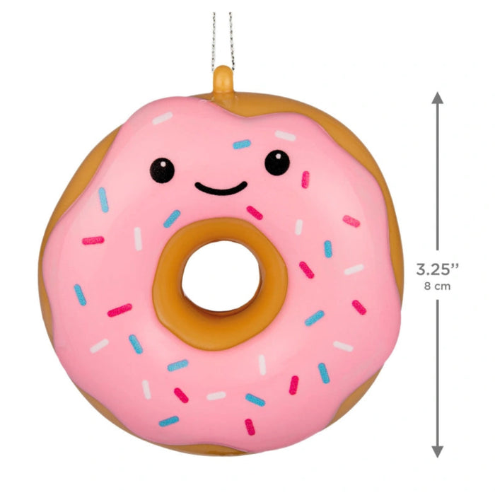 This Hallmark Smiling Sprinkle Donut Shatterproof Hallmark Ornament adds a sweet and cheerful touch to your holiday décor.