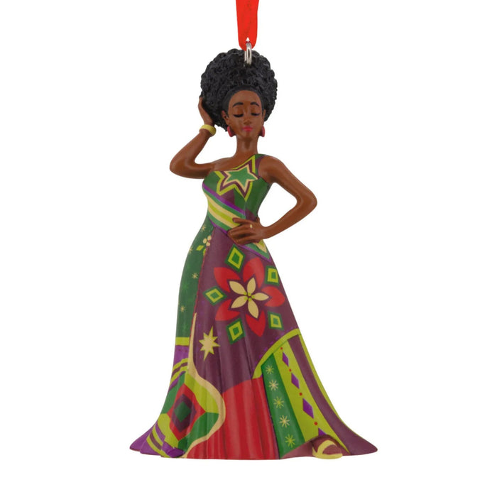 Hallmark ornament featuring a stylish Black woman in a fashionable holiday-inspired design