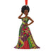 Hallmark ornament featuring a stylish Black woman in a fashionable holiday-inspired design