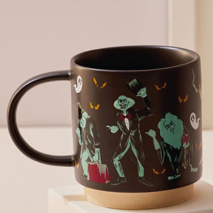 This Hallmark Disney The Haunted Mansion Color-Changing Mug brings the spooky magic of the iconic Disney attraction to every sip.