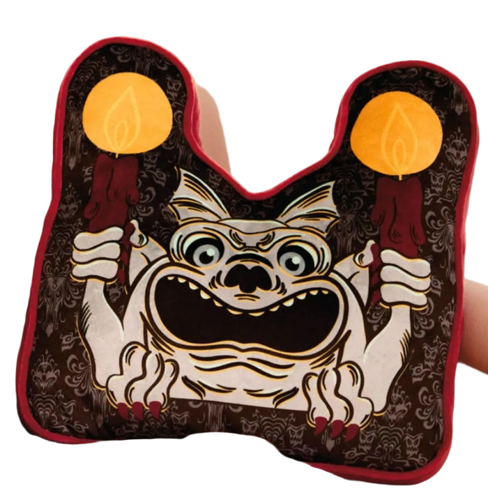 This Hallmark Disney The Haunted Mansion Gargoyle Throw Pillow brings the mysterious charm of the iconic Disney attraction into your home décor. 