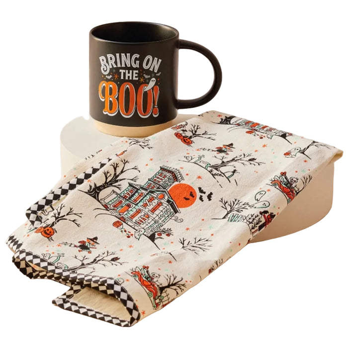 This Hallmark Vintage Halloween Scenes Tea Towel brings nostalgic seasonal charm to your kitchen with classic Halloween-inspired artwork.