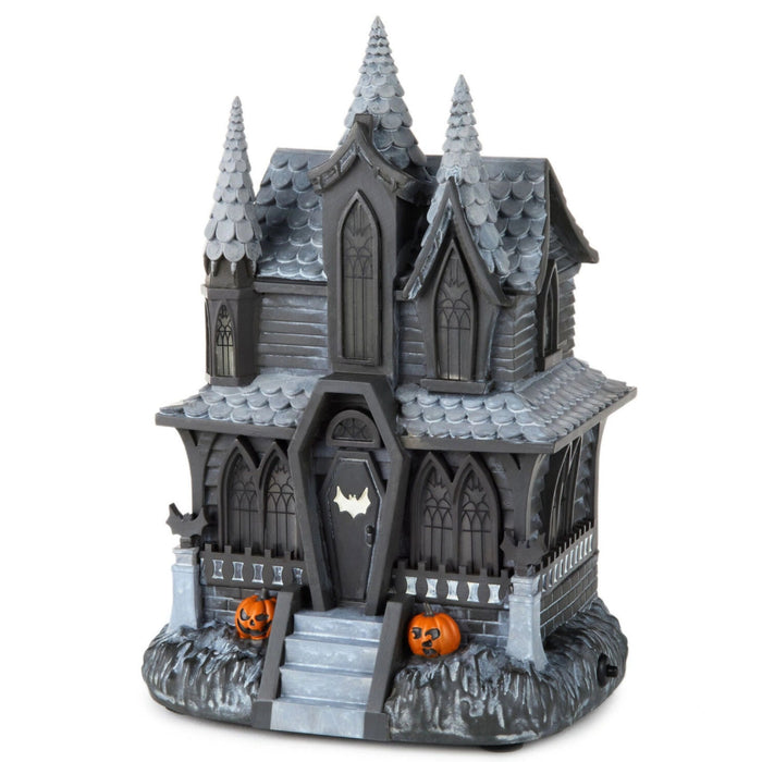 Hauntsville Collection Vampire Manor 9.75-inch Halloween tabletop decoration featuring a gothic haunted mansion with built-in light and spooky sound