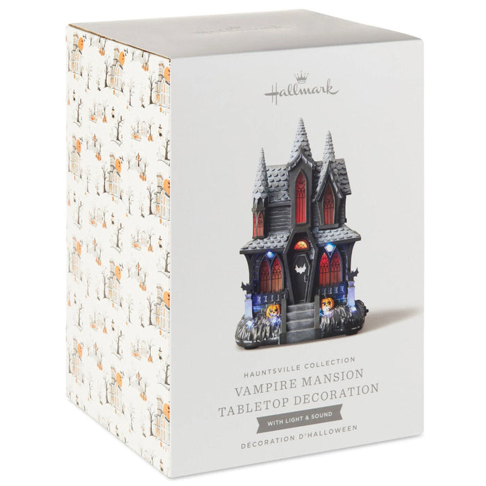 Hauntsville Collection Vampire Manor 9.75-inch Halloween tabletop decoration featuring a gothic haunted mansion with built-in light and spooky sound