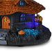 This Hallmark Hauntsville Collection Witch House Tabletop Decoration adds spooky charm and whimsical Halloween style to your seasonal décor.