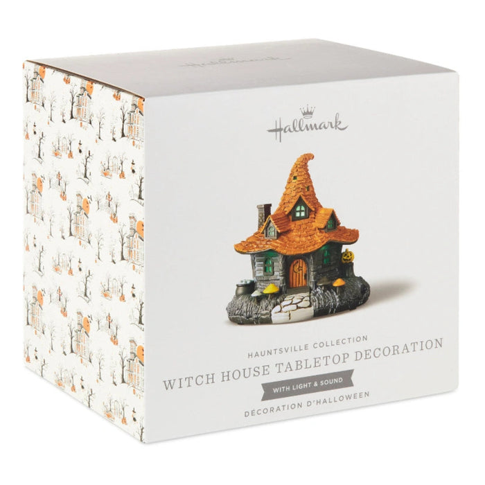 This Hallmark Hauntsville Collection Witch House Tabletop Decoration adds spooky charm and whimsical Halloween style to your seasonal décor.