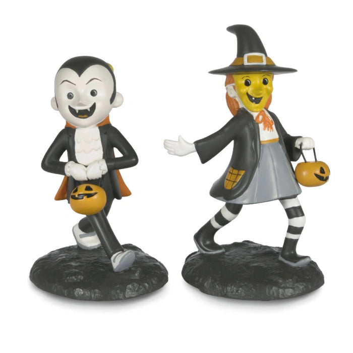 This Hallmark Hauntsville Collection Trick-or-Treaters Tabletop Decorations Set of 2 brings playful Halloween charm to your seasonal home décor. 