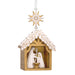 Decorative nativity scene ornament with a star on a white background