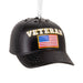 Black cap ornament with 'VETERAN' and American flag on a white background