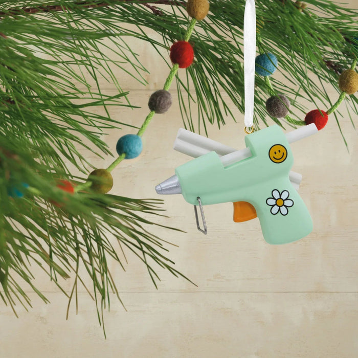 Hallmark Glue Gun Christmas ornament featuring a mint green glue gun design, perfect for DIY enthusiasts, crafters, and creative holiday décor.
