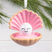 Hallmark Oyster With Pearl Christmas ornament featuring an open oyster shell with a smiling pearl resting on a pink interior, perfect for coastal holiday décor.