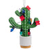 Hallmark Seasonal Cactus Christmas ornament featuring a potted cactus decorated with festive Christmas lights for a desert-inspired holiday display.