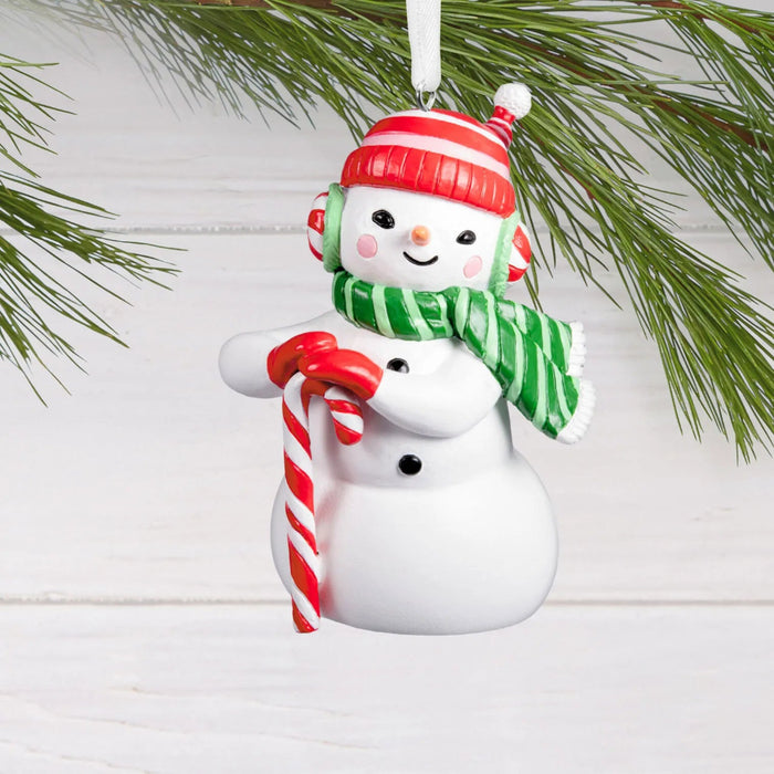 Hallmark Festive Snowman Christmas ornament featuring a cheerful snowman design for holiday tree décor