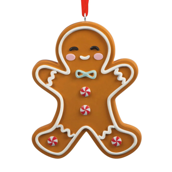Hallmark Gingerbread Man Cookie Christmas ornament featuring a smiling frosted gingerbread man with peppermint candy buttons and a hanger attachment.