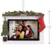 Hallmark Cozy Fireplace 2026 Photo Frame Christmas ornament featuring a festive fireplace with greenery, red stocking, miniature evergreen tree, and photo holder.