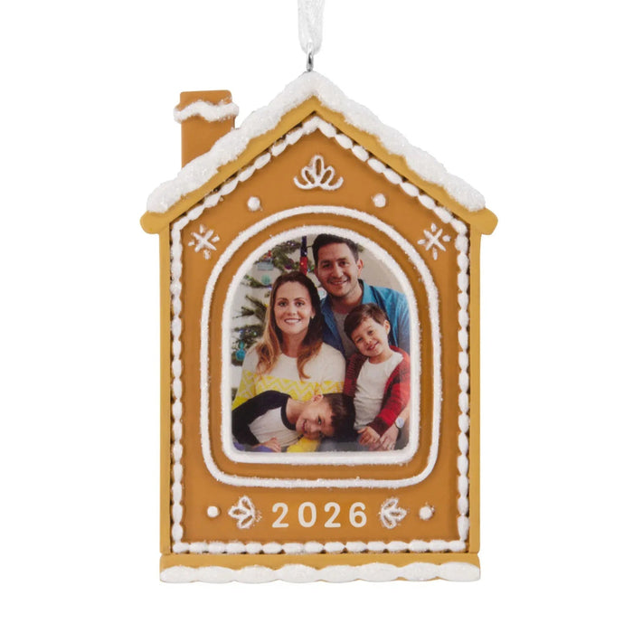 Hallmark Gingerbread House 2026 Photo Frame Christmas ornament featuring a glittery gingerbread house with white frosting accents and a photo holder.
