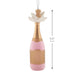 Hallmark Pink Champagne Christmas ornament featuring a gold-wrapped bottle with sparkling pink champagne bubbles bursting from the cork.