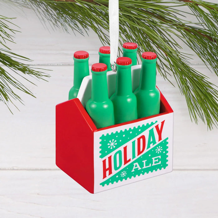 Hallmark Seasonal Six-Pack Christmas ornament featuring six festive red and green beer bottles in a caddy, perfect for beer lovers and holiday décor.