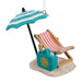 Hallmark Retired and Happy Christmas ornament featuring a beach chair, umbrella, sand, and beach bag with “Retired & Happy” message.