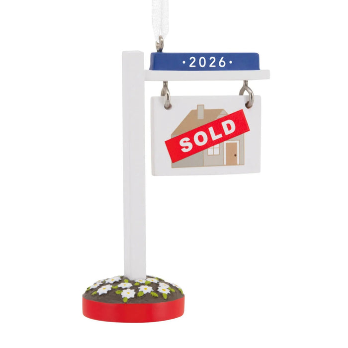 Hallmark New Home Sold 2025 Christmas ornament featuring a year-dated real estate sign with “Sold 2026” message for new homeowners.