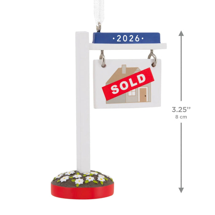 Hallmark New Home Sold 2025 Christmas ornament featuring a year-dated real estate sign with “Sold 2026” message for new homeowners.