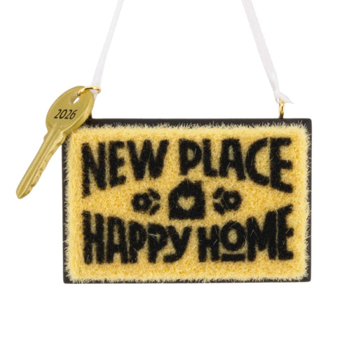 Hallmark New Home 2026 Christmas ornament featuring a resin doormat with “New Place, Happy Home 2026” message and a year-dated house key.