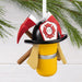Hallmark Firefighter Gear Christmas ornament featuring a firefighter helmet, air tank, and crossed axes in a detailed resin design.