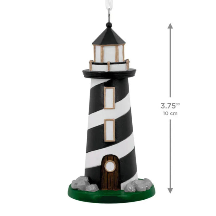 Lighthouse Hallmark Ornament featuring a detailed coastal lighthouse design for Christmas tree décor and nautical holiday decorating.