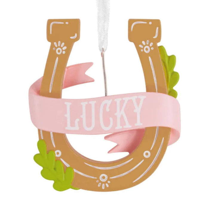 Lucky Horseshoe Hallmark Christmas ornament with pink Lucky banner and green leaf accents.