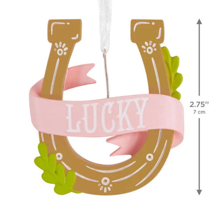 Lucky Horseshoe Hallmark Christmas ornament with pink Lucky banner and green leaf accents.