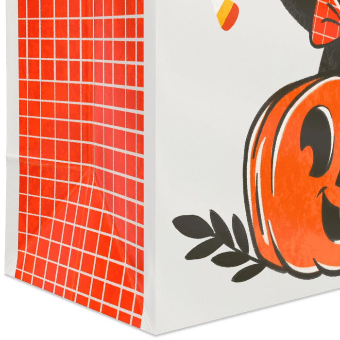 6.5-inch Halloween gift bag featuring a cute black cat sitting inside a smiling jack-o'-lantern pumpkin with a matching gift tag, perfect for candy, treats, party favors, and small Halloween gifts.