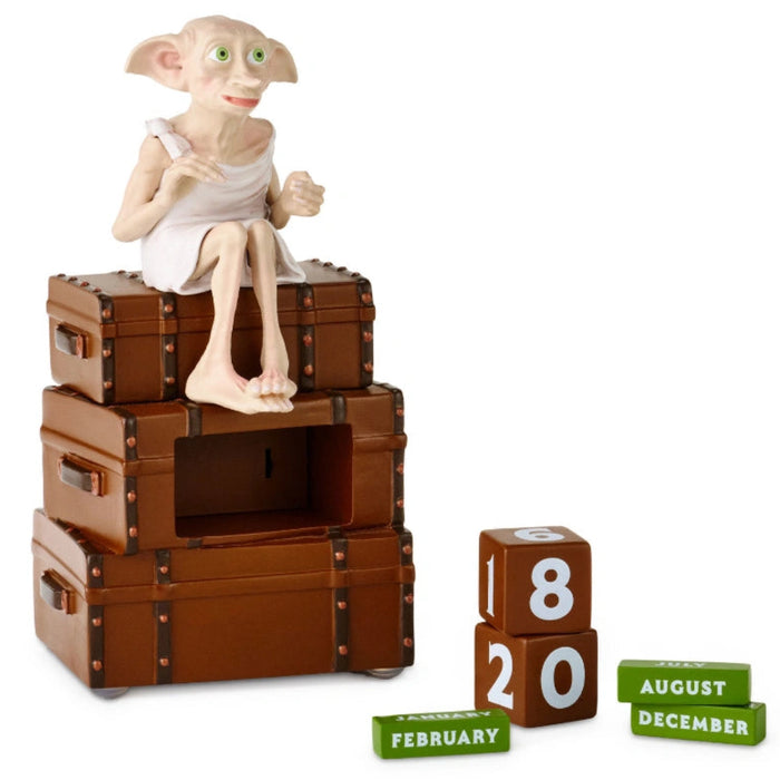 Hallmark Harry Potter Dobby on Suitcases Perpetual Calendar With Sound featuring Dobby the house-elf sitting on stacked suitcases with a reusable date display and magical collectible design.