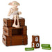 Hallmark Harry Potter Dobby on Suitcases Perpetual Calendar With Sound featuring Dobby the house-elf sitting on stacked suitcases with a reusable date display and magical collectible design.