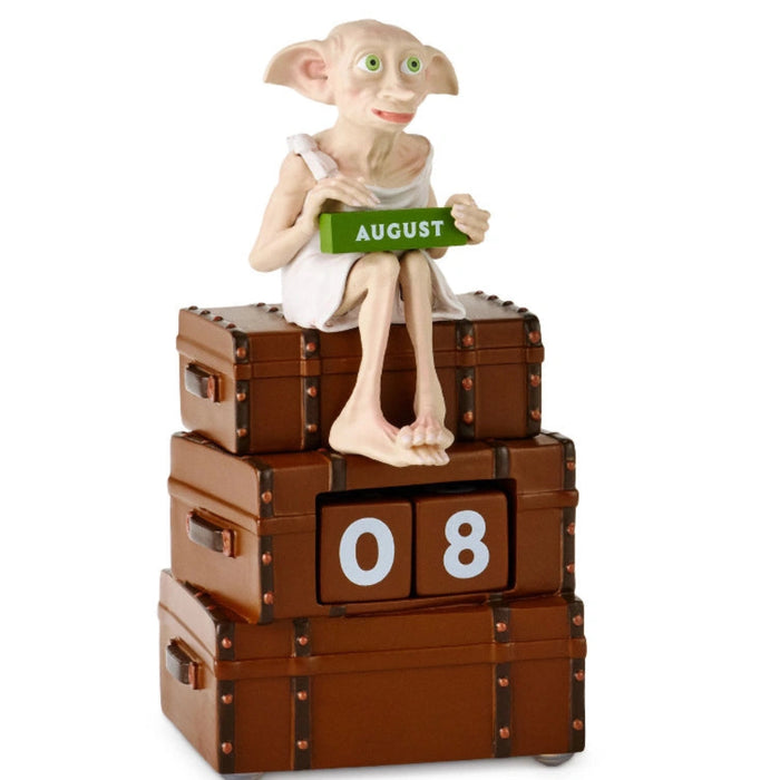 Hallmark Harry Potter Dobby on Suitcases Perpetual Calendar With Sound featuring Dobby the house-elf sitting on stacked suitcases with a reusable date display and magical collectible design.