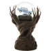 Harry Potter Whomping Willow snow globe featuring illuminated LED lighting, animated motion, swirling glitter, and a detailed magical tree scene inspired by the Wizarding World.
