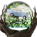 Harry Potter Whomping Willow snow globe featuring illuminated LED lighting, animated motion, swirling glitter, and a detailed magical tree scene inspired by the Wizarding World.