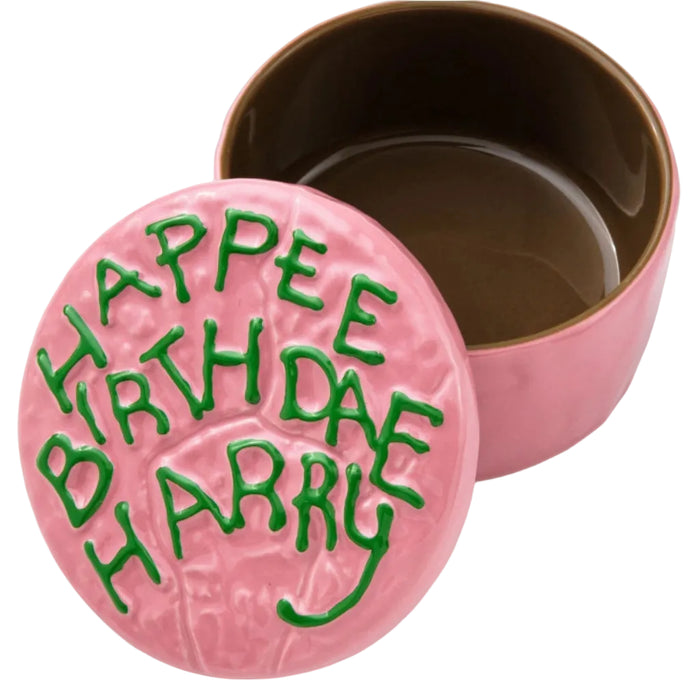 This Hallmark Harry Potter™ Birthday Cake Lidded Trinket Dish adds a magical touch to your home with a charming design inspired by the wizarding world.