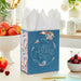 Elegant Mother’s Day gift bag (medium size) shown on a table with a card
