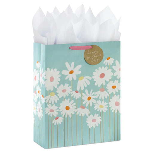Extra‑large slate blue Mother’s Day gift bag with white daisy artwork, gold‑tone stems, round “happy mother’s day” tag