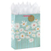 Extra‑large slate blue Mother’s Day gift bag with white daisy artwork, gold‑tone stems, round “happy mother’s day” tag