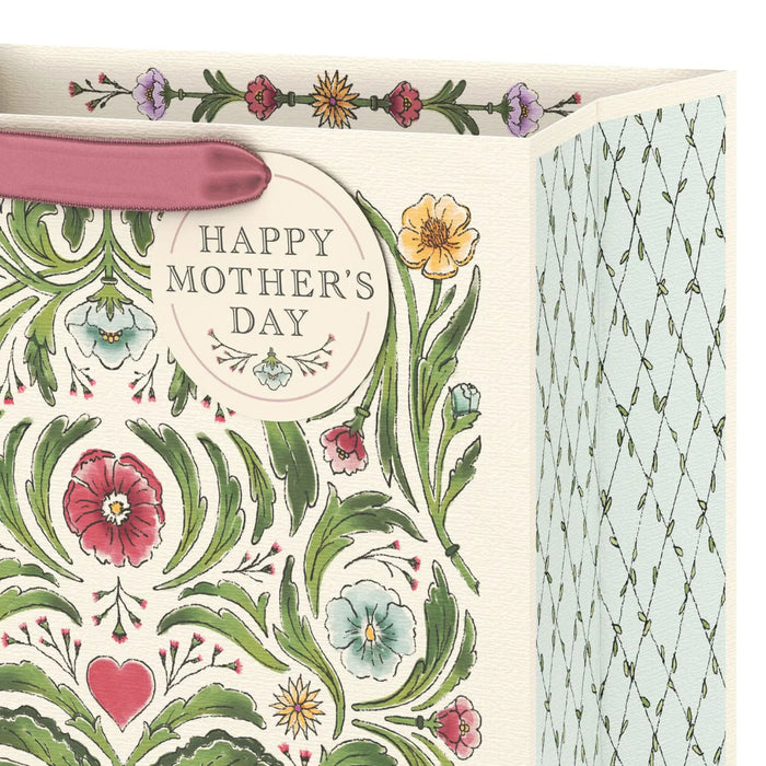 Close‑up of ivory botanical Mother’s Day gift bag