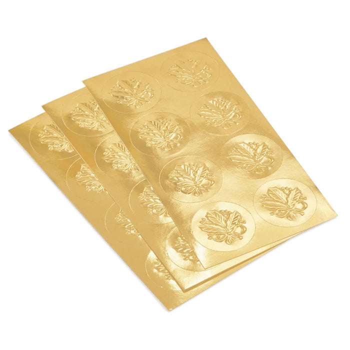 Hallmark Gold Holly Seals pack of 24 with holly and red ribbon design, festive gold Christmas envelope stickers for holiday cards and letters