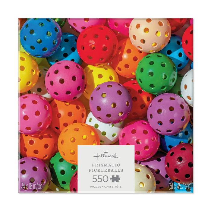 Prismatic Pickleballs 550-piece jigsaw puzzle featuring a colorful pattern of vibrant pickleballs.