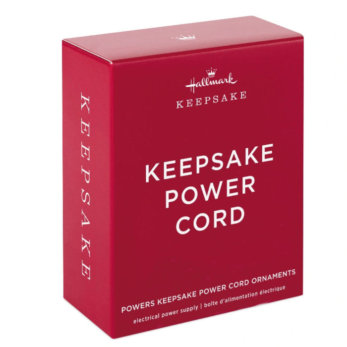 This Hallmark Keepsake Power Cord is an essential accessory designed to power compatible Hallmark Keepsake Storytellers ornaments and interactive holiday decorations.