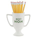 “Best Mom” ceramic trophy (6.12" × 5.87" × 3.5") shown on a desk with pencils, highlighting its use as a pen holder or organizer