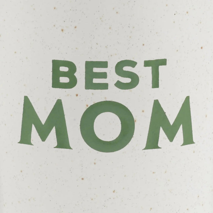 Close-up of speckled white ceramic “Best Mom” trophy