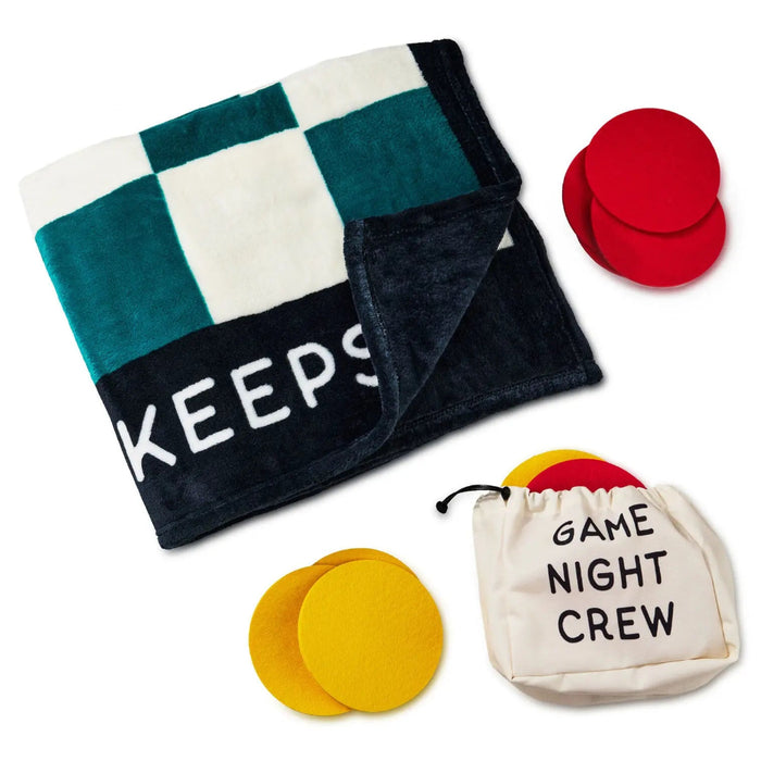 Checkerboard fleece blanket displayed with its drawstring bag labeled “Game Night Crew”