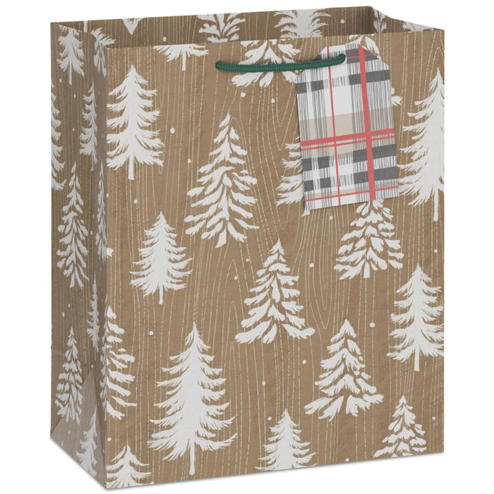 9.6-inch medium Christmas gift bag featuring white trees on a woodgrain kraft background with an included gift tag.