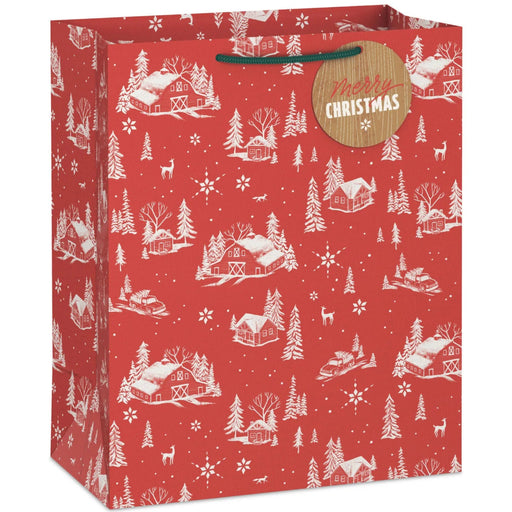 13-inch large Christmas gift bag featuring snowy barns on a red background with an included gift